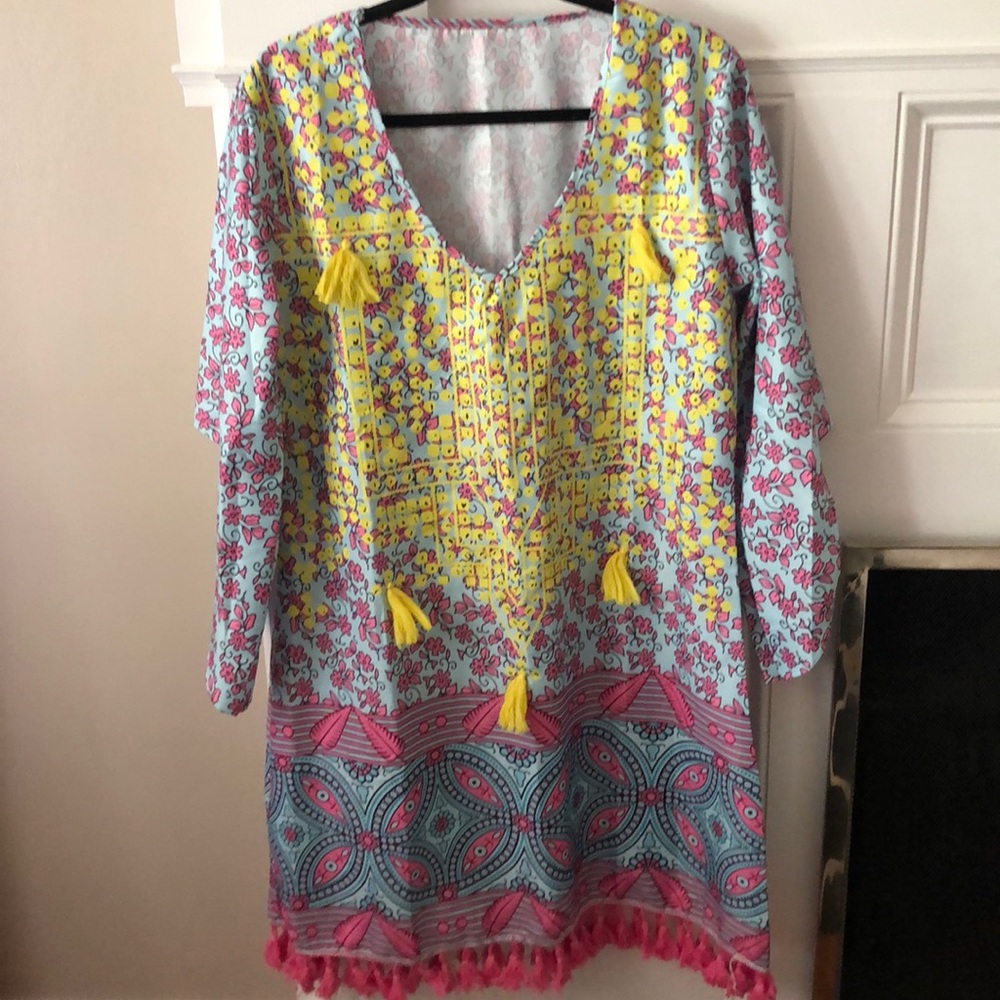 Poly print with yellow appliqué with tassels